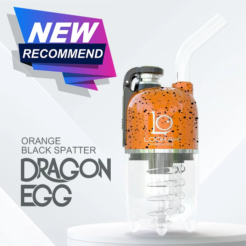 Front profile view of the Lookah Dragon Egg Electric Dab E-Rig in a vibrant orange hue with bold black splatter patterns. This capsule-style portable e-rig features a unique bottom-mounted water bubbler and a magnetic cap to deliver cool, smooth, and filtered concentrate hits on the go.