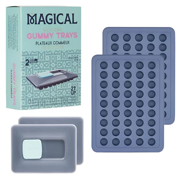 Angled overhead view of two Magical Butter 21UP 2mL Gummy Trays in vibrant green with their clear silicone lids. These premium food-grade silicone molds feature 2mL cavities with a 21UP logo to create perfectly dosed adult candies and infused treats.
