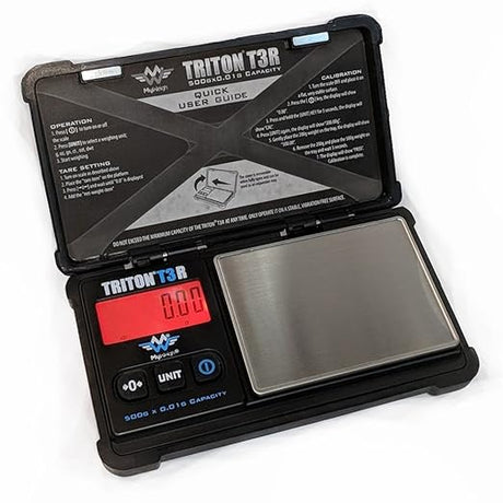 Top down view of the MyWeigh Triton T3 Rechargeable Scale in black with its cover open. This pocket-sized 500g unit features a shock-absorbing rubberized casing and an integrated lithium-ion battery for reliable, cord-free measuring.