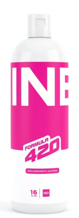 Front view of the Nine9 Formula 420 Isopropyl Cleaner 16oz featuring a pink label. This 99.9% isopropyl alcohol solution provides frictionless operation to actively dissolve hardened botanical tar from borosilicate, quartz, and metal hardware.