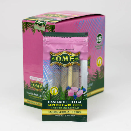 Front view of the closed OME hand rolled tendu leaf wraps 15-count display box in bright pink. This wholesale retail display provides shops with premium, tobacco-free pre-rolled palm leaf wraps for a smooth and slow-burning smoke.