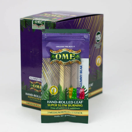 Front view of the closed OME hand rolled tendu leaf wraps 15-count display box in purple. This wholesale retail display provides shops with premium, tobacco-free pre-rolled palm leaf wraps for a smooth and slow-burning smoke.