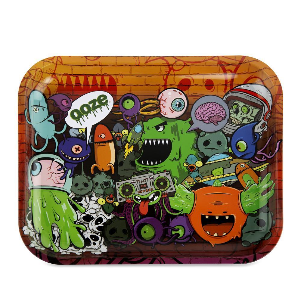 metal Ooze rolling tray featuring the monstrosity art on a graffiti brick.