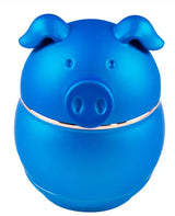 Front angled view of the 62mm piggy shape metal grinder in metallic blue. This 4-piece novelty swine-themed unit features a magnetized top enclosure to manually process unrefined botanical materials.