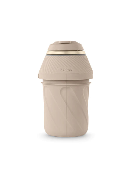 Close-up top down view of the Puffco Proxy Desert Edition in tan highlighting the glazed ceramic 3D Chamber. This advanced heating technology heats concentrates from the side walls rather than the bottom to deliver incredible flavor and maximize oil usage.