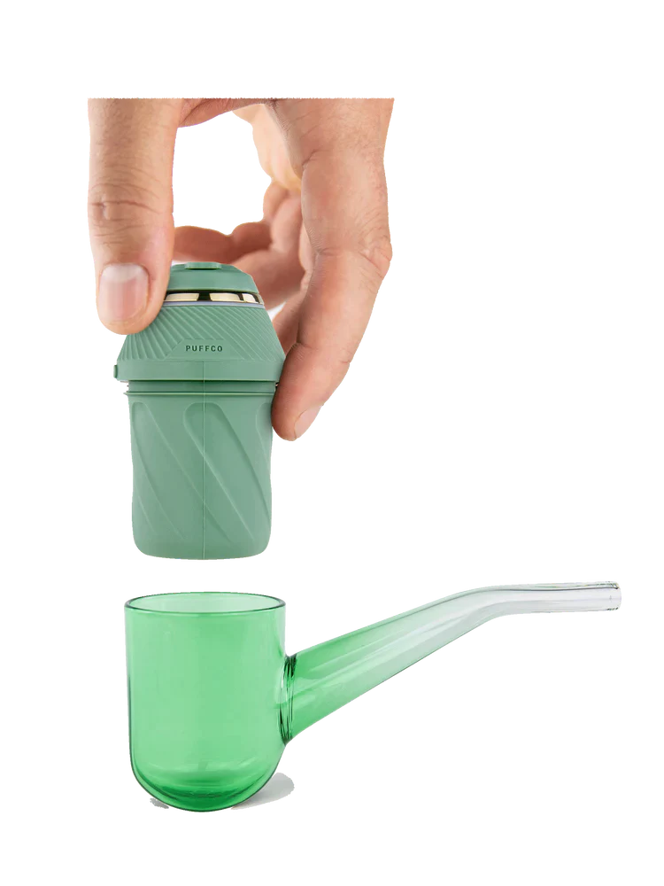 Exploded view of the Puffco Proxy Kit showing the green electronic base unit separated from the glass pipe stem. This illustrates the modular design that allows the core heating unit to adapt to various custom glass attachments.