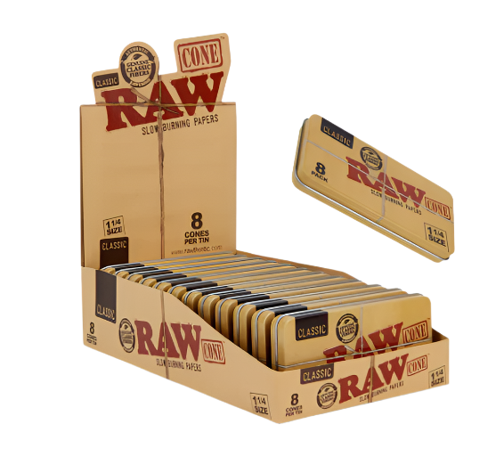 Front angled view of the RAW 1 1/4 Cones 8-Pack Tin 12-count wholesale counter display box in classic unbleached tan and red branding. This pop-up retail cardboard display holds twelve metal tins neatly at the cash wrap for fast-turning secondary register transactions.