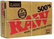 Front flat lay view of a single RAW Classic 1 1/4 500s rolling paper box in natural tan with clean red and black lettering. This large, durable protective box houses a massive supply of 500 unbleached, translucent papers for heavy consumers and dedicated rollers.