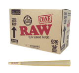 Front angled view of the RAW Classic King Size Bulk Cones 800-count box in natural kraft brown packaging. Made from unrefined, unbleached plant fibers, this massive bulk case provides dispensaries and commercial rollers with a reliable supply of premium pre-rolls.