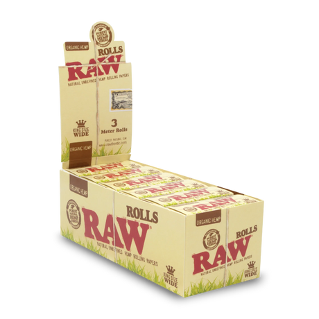 Front angled view of the RAW Classic King Size Wide 3-Meter Rolls 12-count display box in natural kraft brown packaging with red branding. This retail-ready carton provides smoke shops with an attractive countertop presentation for these customizable, unbleached rolling papers.