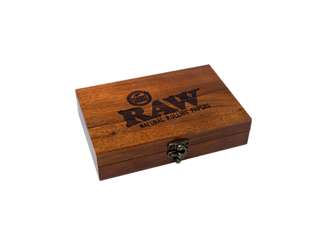 Top down view of the RAW double six dominoes set in a natural wood finish box featuring the classic red RAW logo. This 28-piece premium game set comes in a durable storage case, making it the perfect collectible accessory for game nights and smoke sessions.