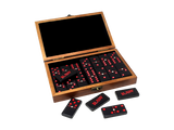 Angled overhead view of the RAW double six dominoes set inside its open natural wood box. The 28 individually crafted dominoes fit perfectly into the protective wooden case for easy travel and organized storage.