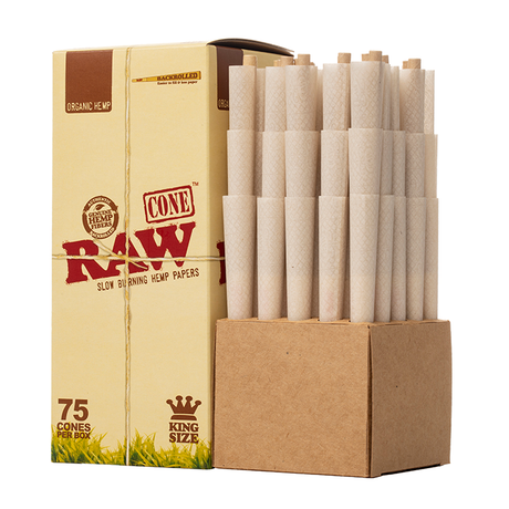 Angled overhead view of the RAW 75-count box opened to reveal rows of neatly nested King Size pre-rolled cones. Each light beige cone comes equipped with a built-in natural paper filter tip to maintain optimal structural shape and prevent loose material fall-through.