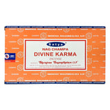 Front view of the Satya Incense 15g 12-Count Display box in the Divine Karma variant featuring deep indigo hues. This combustible agarbatti stick display unit is ideal for vertical counter placement to drive impulse checkout transactions.