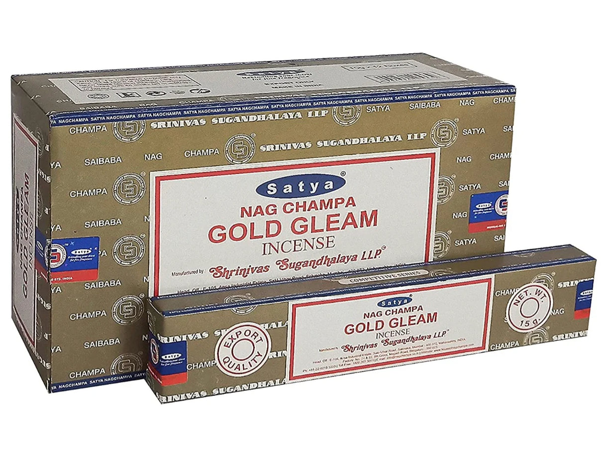 Front view of the Satya Incense 15g 12-Count Display box in the Gold Gleam variant featuring gold backgronds. This combustible agarbatti stick display unit is ideal for vertical counter placement to drive impulse checkout transactions.