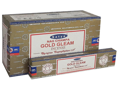 Front view of the Satya Incense 15g 12-Count Display box in the Gold Gleam variant featuring gold backgronds. This combustible agarbatti stick display unit is ideal for vertical counter placement to drive impulse checkout transactions.