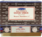 Front view of the Satya Incense 15g 12-Count Display box in the Good Vibes variant featuring colorful rainbow typography. This combustible agarbatti stick display unit is ideal for vertical counter placement to drive impulse checkout transactions.