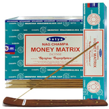 Front view of the Satya Incense 15g 12-Count Display box in the Money Matrix variant featuring metallic gold typography. This combustible agarbatti stick display unit is ideal for vertical counter placement to drive impulse checkout transactions.