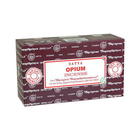 Front view of the Satya Incense 15g 12-Count Display box in the Opium variant featuring rich crimson accents. This combustible agarbatti stick display unit is ideal for vertical counter placement to drive impulse checkout transactions.