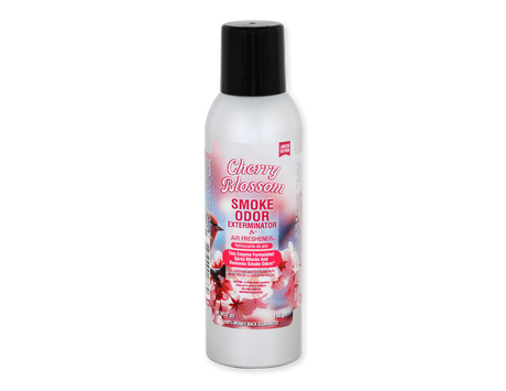 Front view of the Smoke Odor Exterminator Air Freshener 7oz in a white and pink cherry blossom design. This aluminum aerosol canister features an active enzyme formula that physically binds to and neutralizes airborne smoke and environmental smells.