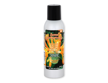 Front view of the Smoke Odor Exterminator Air Freshener 7oz in a green and orange sweet honeysuckle design. This aluminum aerosol canister features an active enzyme formula that physically binds to and neutralizes airborne smoke and environmental smells.