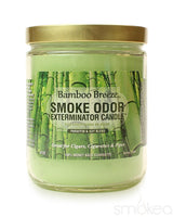Front view of the Smoke Odor Exterminator Candle 13oz in a light green Bamboo Breeze design. This enzyme-activated glass mason jar candle physically binds to and neutralizes airborne smoke and environmental smells.