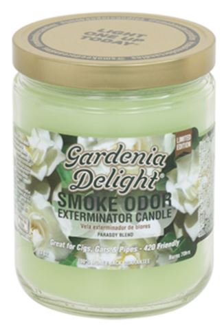 Front view of the Smoke Odor Exterminator Candle 13oz in a soft white and floral Gardenia Delight design. This enzyme-activated glass mason jar candle physically binds to and neutralizes airborne smoke and environmental smells.
