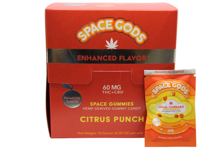 Angled overhead view of the Space Gods Delta 9 and CBD gummy retail display box in bright orange and black. This wholesale bulk packaging is ideal for smoke shop countertops and effectively showcases the potent 60mg citrus punch edibles to customers.