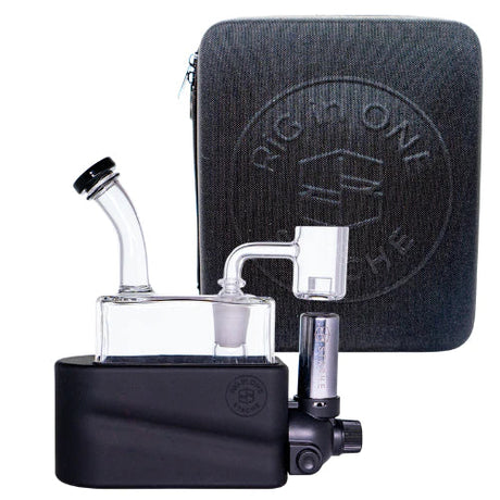 Flat lay overhead view of the full Stache Rig in One kit inside its custom padded zip-up travel carrying case with molded EVA foam inserts. The set includes a bubble carb cap, stainless steel dab tool, torch base, and glass.