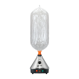 Front standing view of the Storz & Bickel Volcano Classic Onyx Edition in matte black with a clear Easy Valve balloon attached. The detachable balloon delivery system captures thick, pure vapor for smooth and convenient consumption anywhere in the room.