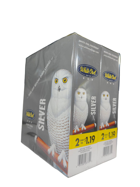 Angled overhead view of the White Owl Slow Burn Silver cigarillos box in sleek silver and white. These popular slow-burning cigarillos come in a wholesale 30-count box of 2-packs, perfect for keeping retail counter displays fully stocked.