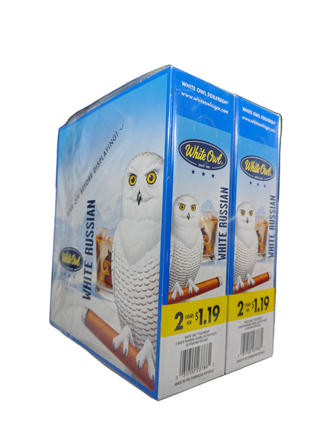 Angled overhead view of the White Owl Slow Burn White Russian cigarillos box in creamy off-white and brown. These popular slow-burning cigarillos come in a wholesale 30-count box of 2-packs, perfect for keeping retail counter displays fully stocked.