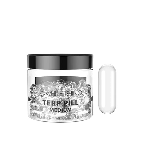 Front view of the White Rhino Terp Pill 50-count retail container in clear glass with a black lid. This bulk jar houses spinning quartz inserts designed to increase surface area and maximize vaporization efficiency inside bangers.