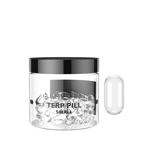Front view of the White Rhino Terp Pill 50-count retail container in clear glass with a black lid. This bulk jar houses spinning quartz inserts designed to increase surface area and maximize vaporization efficiency inside bangers.