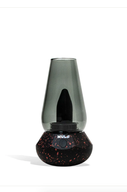 Front view of the Wulf Mods Fang 2-in-1 vaporizer in black-red spatter. This versatile electronic pipe features a 1600mAh battery and a tinted glass bubbler to vape both wax concentrates and 510-thread oil cartridges.