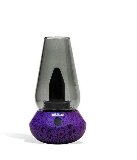 Front view of the Wulf Mods Fang 2-in-1 vaporizer in purple-black spatter. The unit highlights a single-button control structure used to cycle through four adjustable voltage settings between 2.5V and 4.0V.