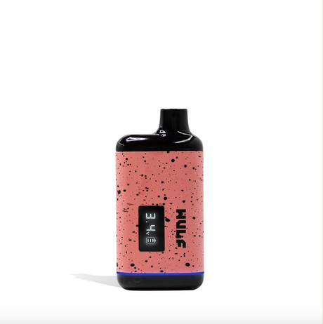 Angled front view of the Wulf Mods Recon concealed cartridge vaporizer in a pink and black spatter finish. This discreet 510-thread battery completely hides up to 2-gram oil cartridges for safe, on-the-go vaping.