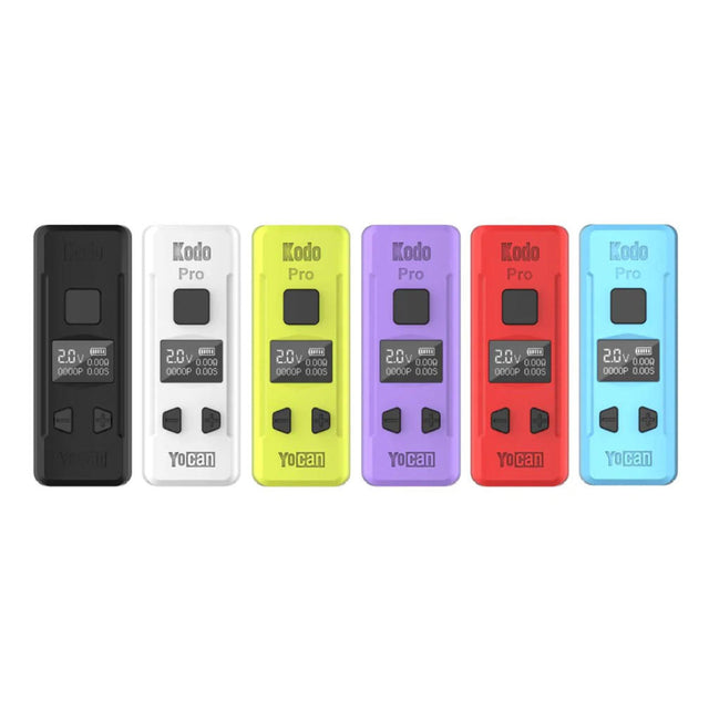 Angled overhead view of multiple Yocan Kodo Pro batteries in assorted vibrant colors. This ultra-compact 510-thread cartridge battery features a 400mAh capacity, adjustable voltage, and a bright OLED digital display for precise control.