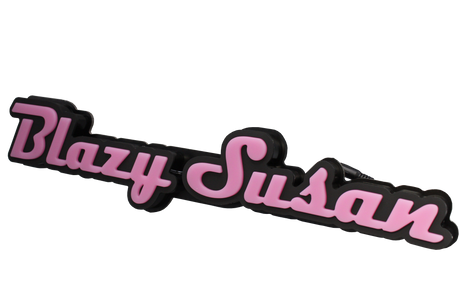 front view of the pink and black neon sign of the iconic Blazy Susan name and font.