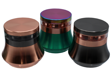 side view of the multiple colors of the Click it large metal grinder. made for grinding and fluffing up larger quantities of flower. its metal construction ensures a long lasting life with sharp teeth.