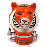 front view of the contained art 100ml ceramic orange tiger jar. A bright ceramic jar with a stylized design of a tiger.