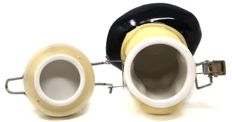 an opened bottom view of the contained art 100ml ceramic stash jar. A durable ceramic body and odor proof seal to keep the contents fresh.