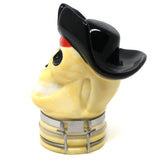 profile view of the contained art 100ml ceramic pirate skull jar. A colorful and playful jar made of ceramic and able to store items.