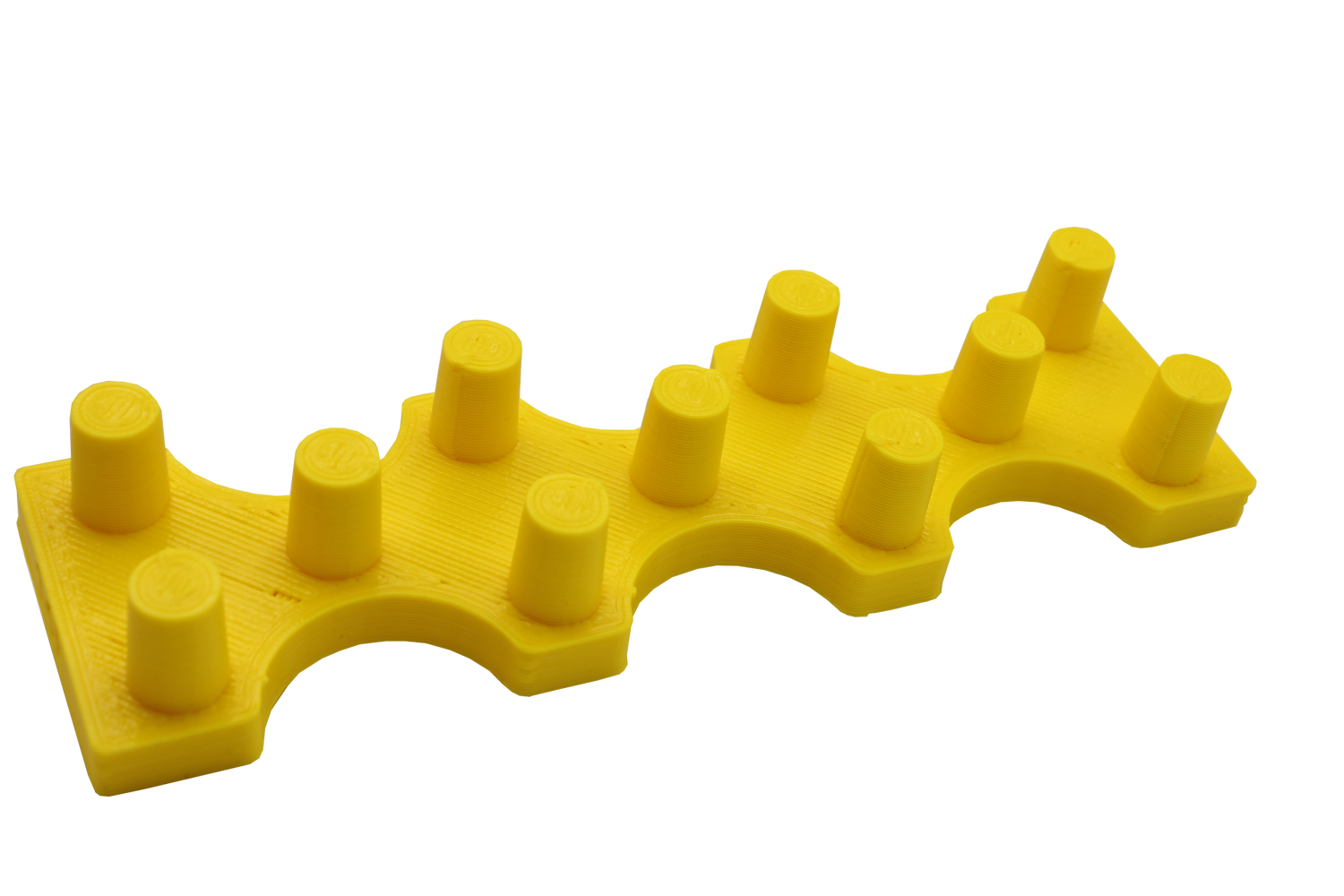 Front view of the dabber box glass display stand. A sturdy base able to hold 14mm accessories upright so that resin coated tips do not spill onto the table. printed in yellow