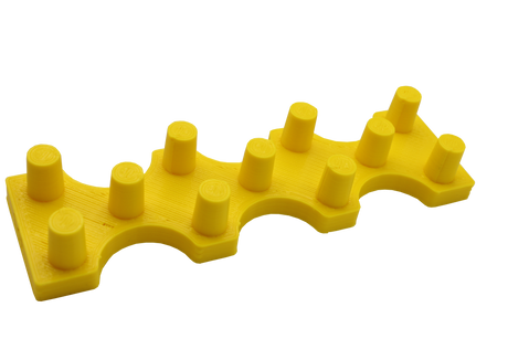 Front view of the dabber box glass display stand. A sturdy base able to hold 14mm accessories upright so that resin coated tips do not spill onto the table. printed in yellow