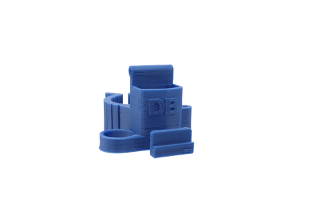 front view of the dabber box rig backpack clip in blue. A organizational tool for holding lighters, dab tools or any other items that a smoker would need for their session.