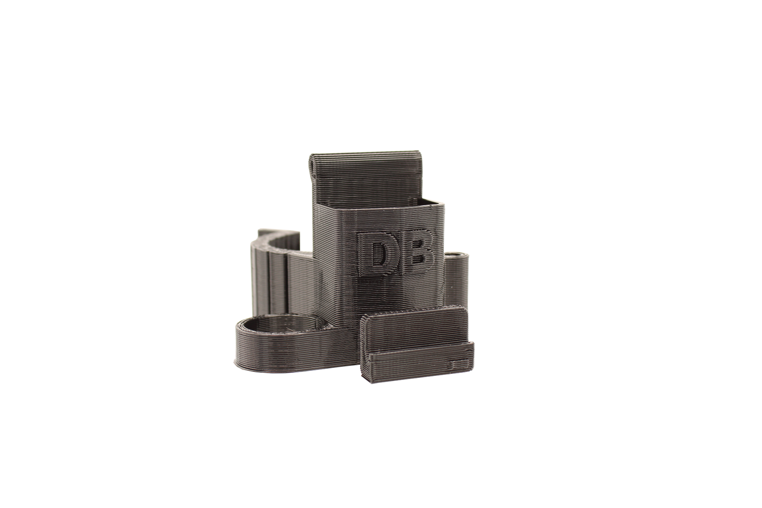 front view of the dabber box rig backpack clip in black. A organizational tool for holding lighters, dab tools or any other items that a smoker would need for their session.