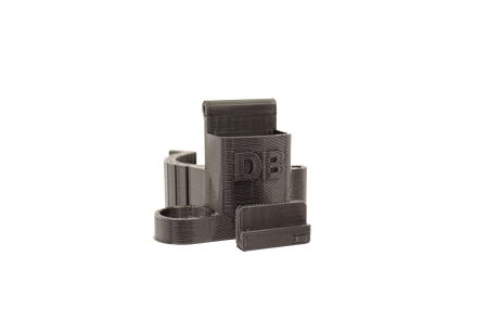 front view of the dabber box rig backpack clip in black. A organizational tool for holding lighters, dab tools or any other items that a smoker would need for their session.