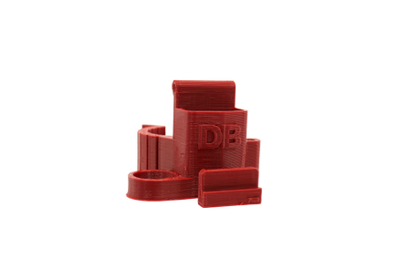 front view of the dabber box rig backpack clip in red. A organizational tool for holding lighters, dab tools or any other items that a smoker would need for their session.