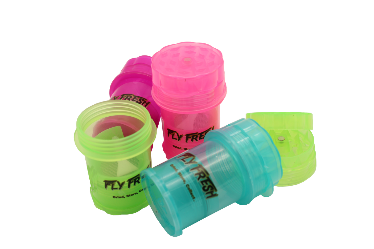 view of the Fly fresh grinder with kief catch. A simple herb grinder with removable herb catcher for clean packing.